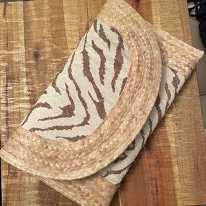 Custom made woven straw clutch.